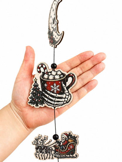Creepy Christmas skeleton hanging decor cocoa mug piece held in hand