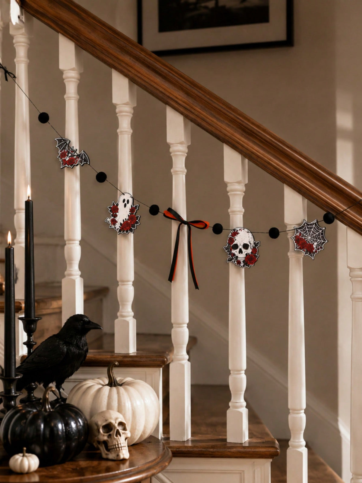 Gothic skull Halloween garland with roses on a staircase railing
