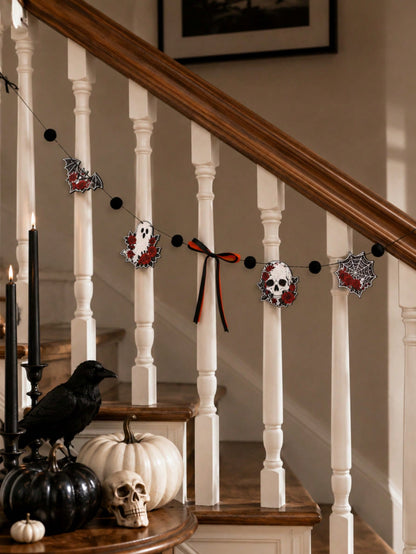 Gothic skull Halloween garland with roses on a staircase railing