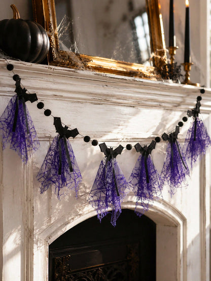 Purple bat Halloween banner on a white fireplace mantel