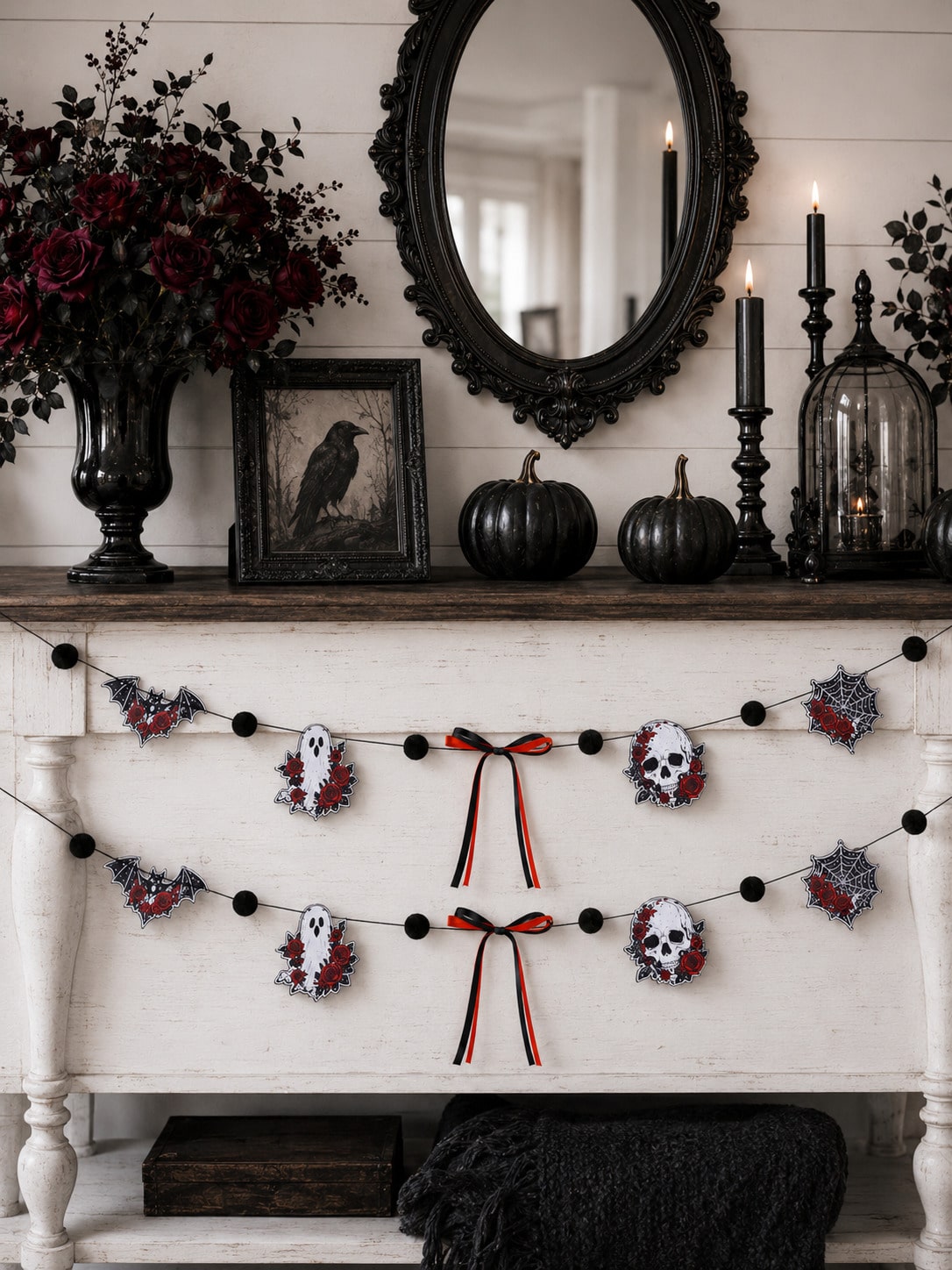 Gothic skull Halloween garland with roses two strands over a mantel