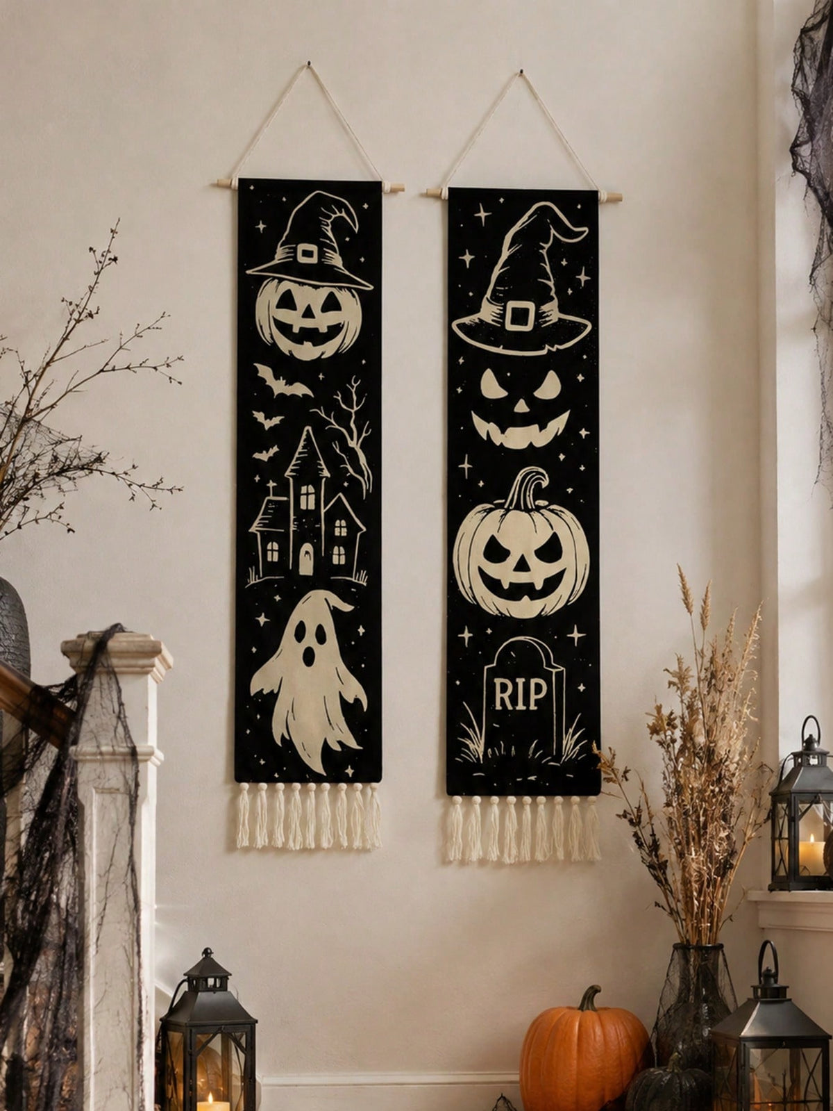 Vintage Halloween tassel wall hanging pair in a corner with branches