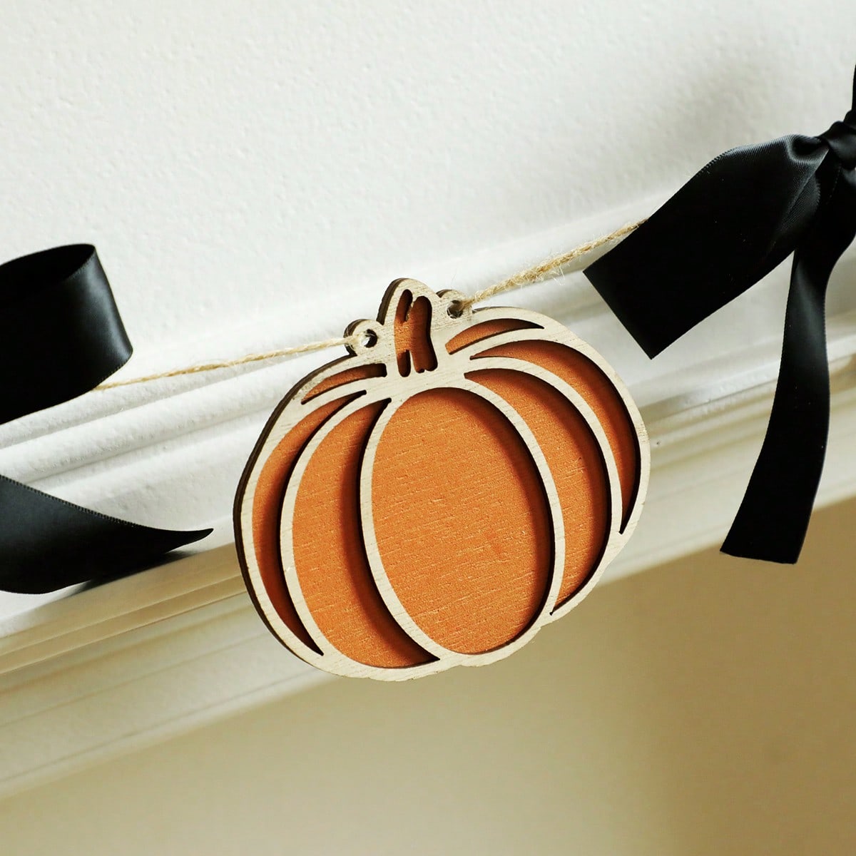 Pumpkin garland with black bows pumpkin cutout close-up