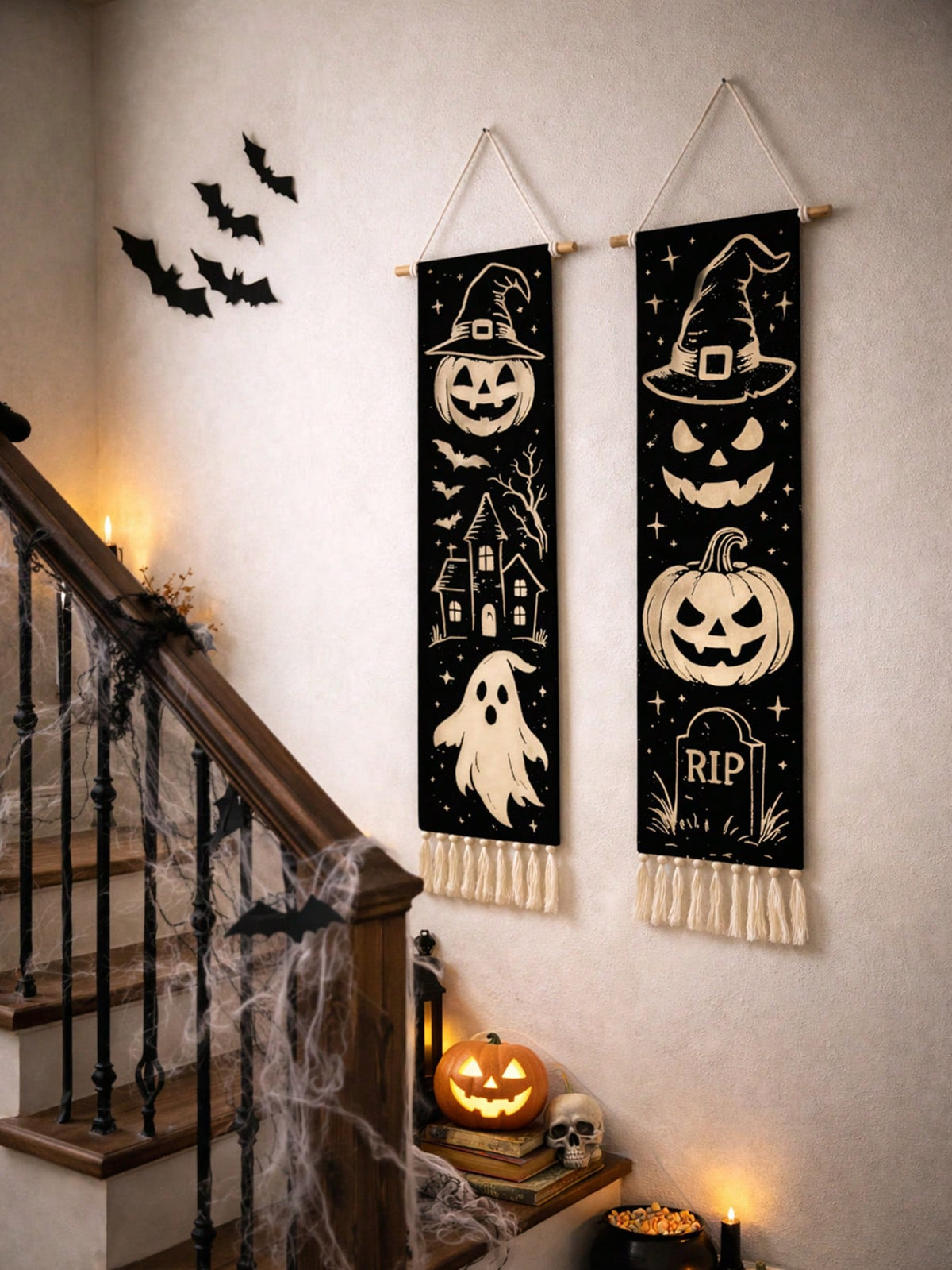 Vintage Halloween tassel wall hanging pair beside a staircase