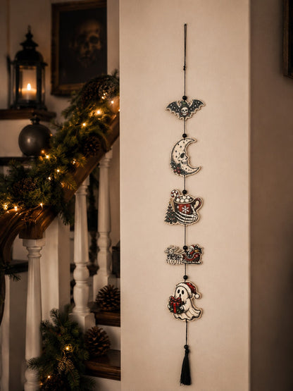 Creepy Christmas skeleton hanging decor by a staircase with garland
