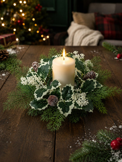 Christmas candle ring wreath with candle on dark wood