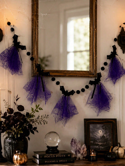 Purple bat Halloween banner above a console table