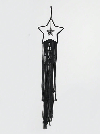 Black macrame moon dream catcher star style on white wall